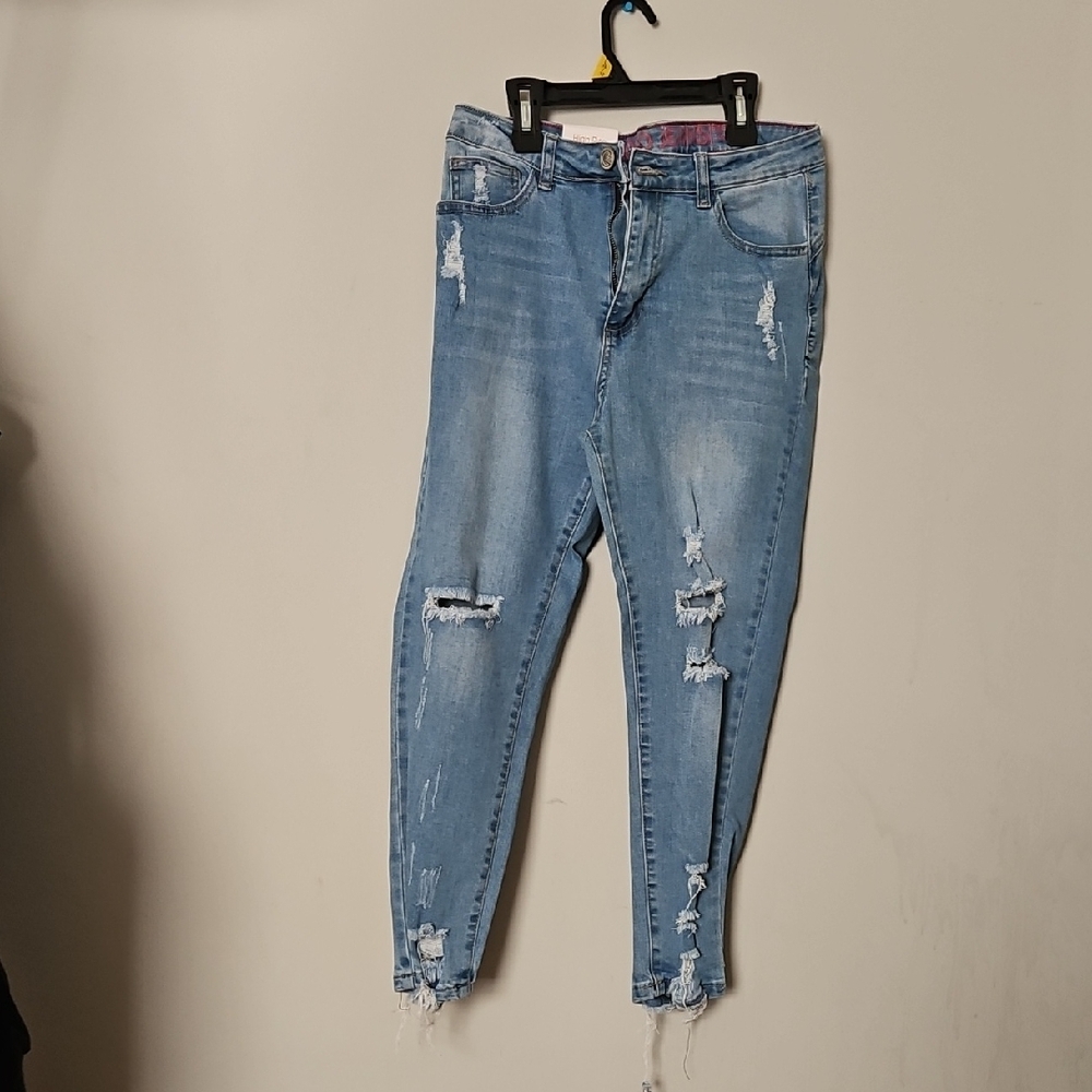 Women's Distressed Blue Jeans
